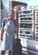 Sam and our dog, Mishka, with kiln load of fired pots